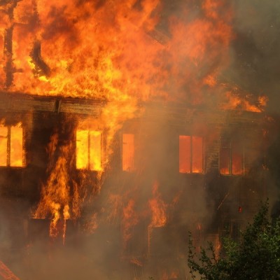 A residence engulfed in flames